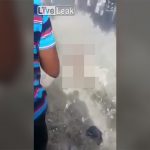 ギャングの仲間である女、怒り狂う市民に殺される動画。